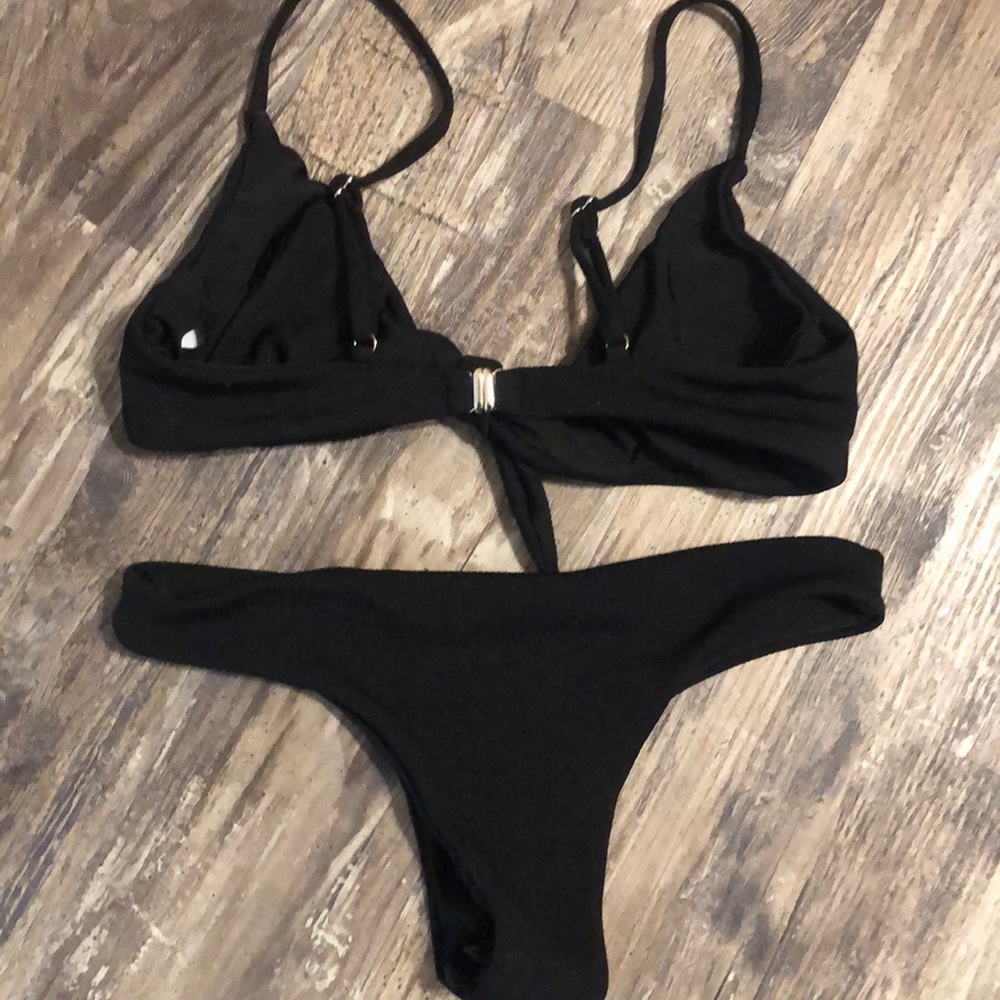 Black ribbed bikini w/ knot and high cut bottoms. - Picture 2 of 2